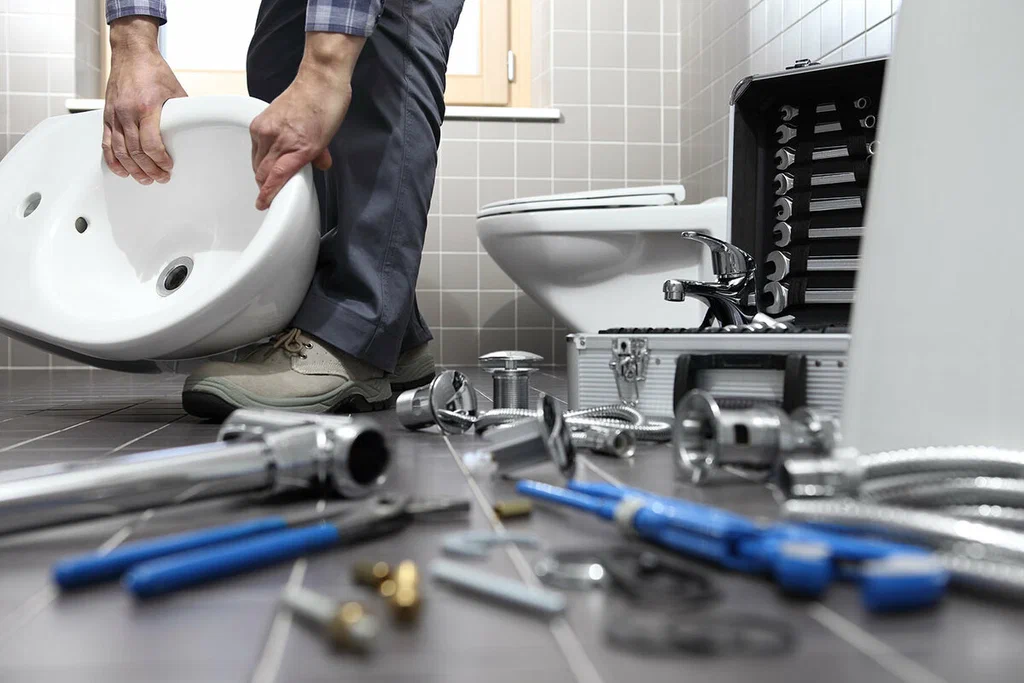 Plumbing tools prepared for a bathroom repair in Carlsbad